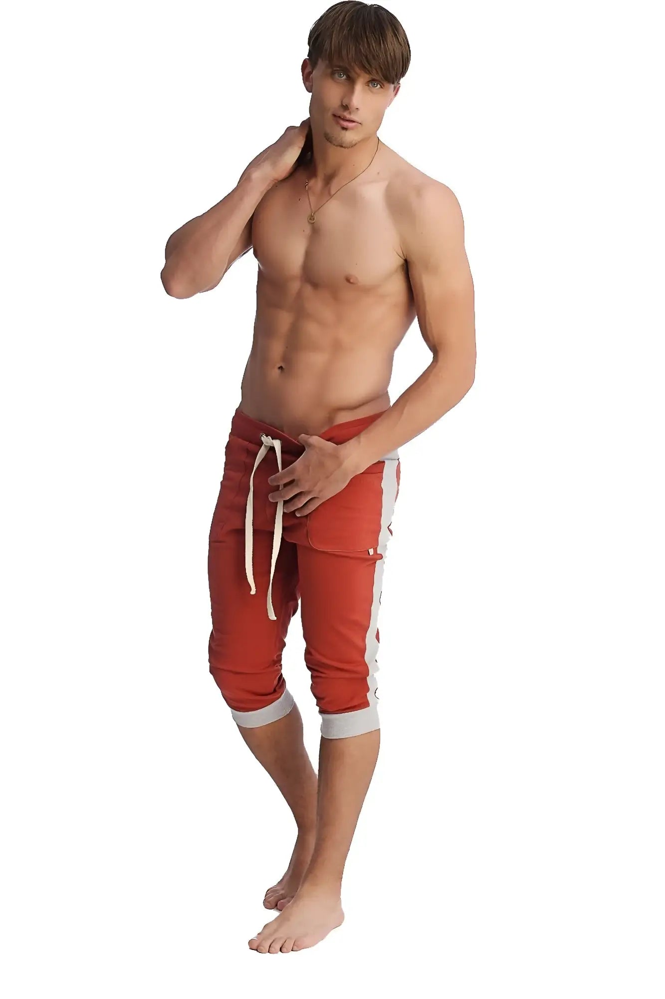 Red athletic shorts with white side stripes and matching drawstring ideal for active wear and casual comfort