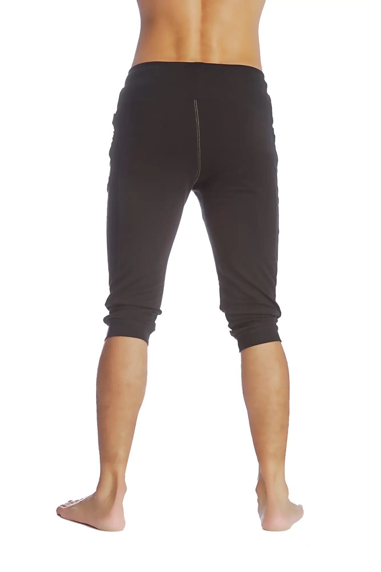 Black cuffed yoga pants with snug fit elastic waistband capri length ideal for athletic wear