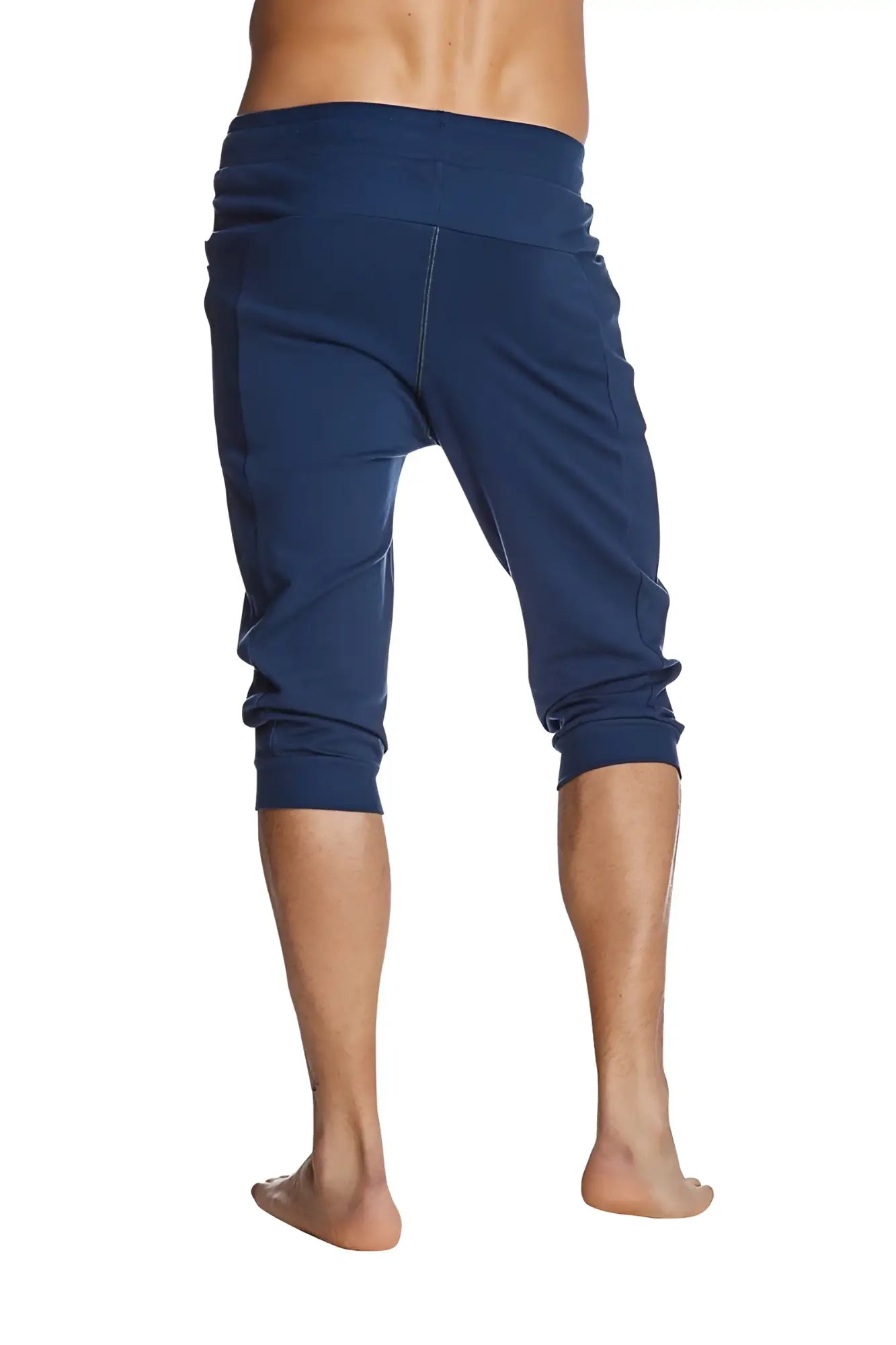 Navy blue stretchy capri yoga pants with elastic waistband and rolled cuffs for comfortable activewear