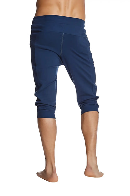 Navy blue stretchy capri yoga pants with elastic waistband and rolled cuffs for comfortable activewear