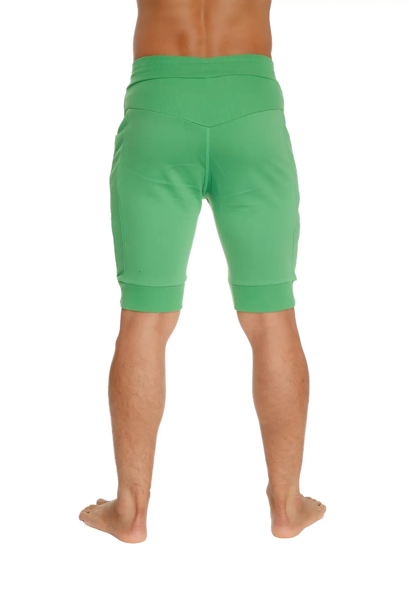 Cuffed yoga short in bamboo green featuring elastic waistband and ribbed cuffs made from soft bamboo fabric