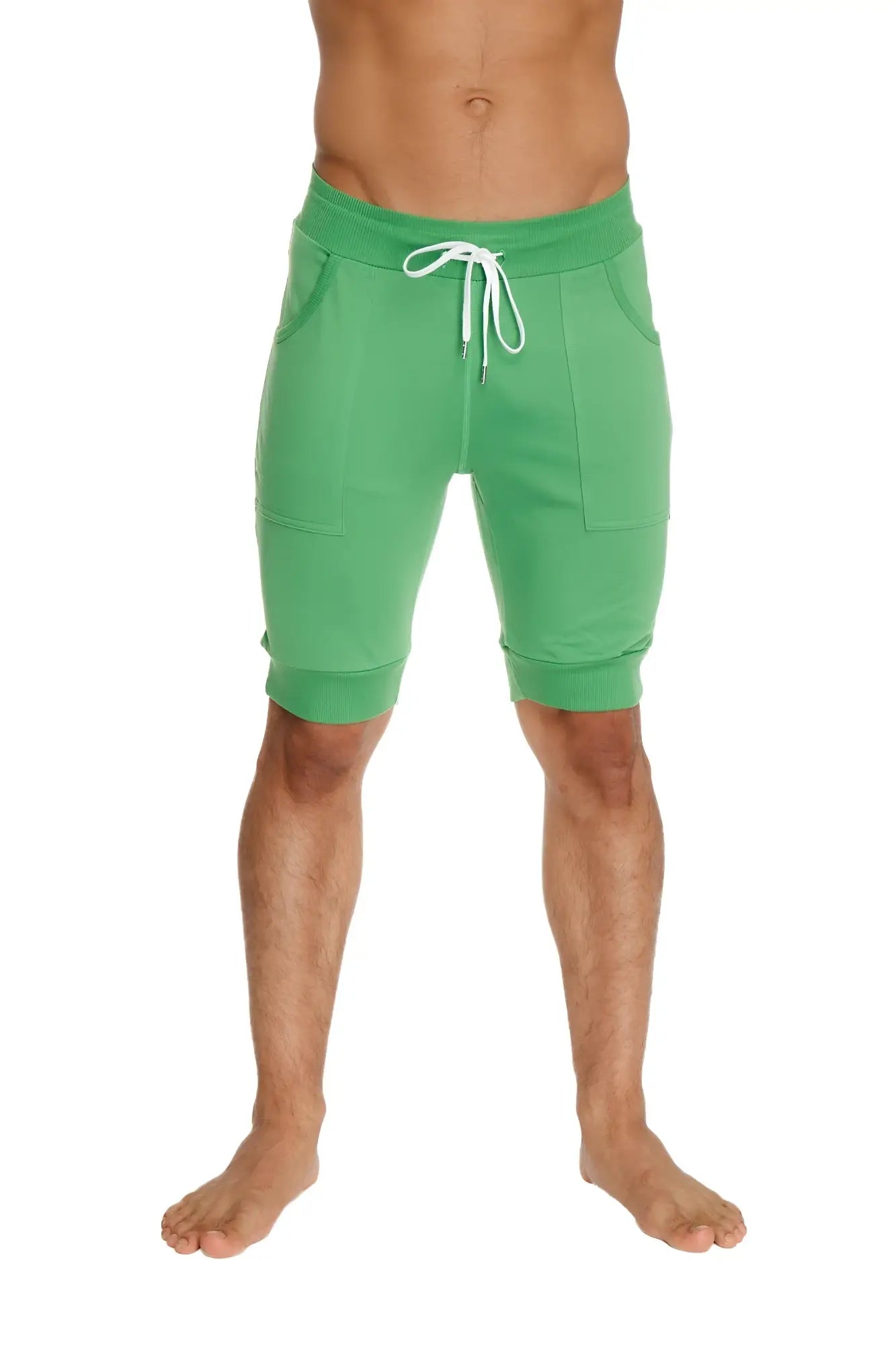 Green bamboo yoga shorts with cuffed hem white drawstring and side pockets for athletic use