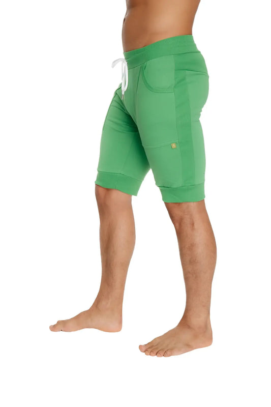 Cuffed yoga shorts in bamboo green with white drawstring and side pockets made from soft bamboo fabric