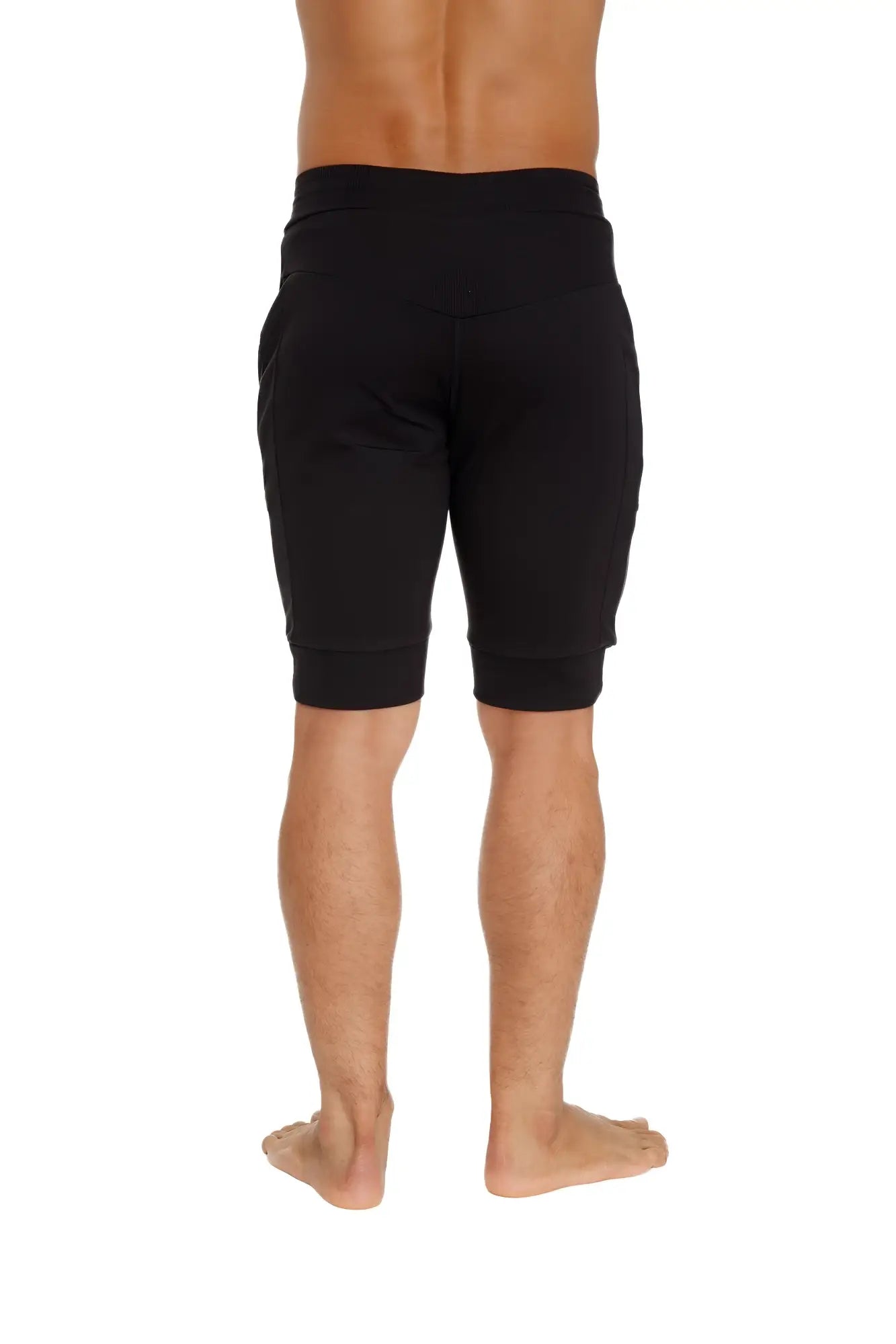 Black cuffed yoga shorts with elastic waistband and ribbed cuffs for comfortable athletic wear