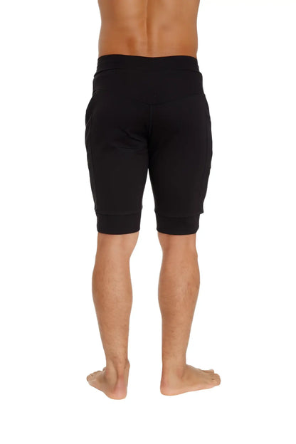 Black cuffed yoga shorts with elastic waistband and ribbed cuffs for comfortable athletic wear