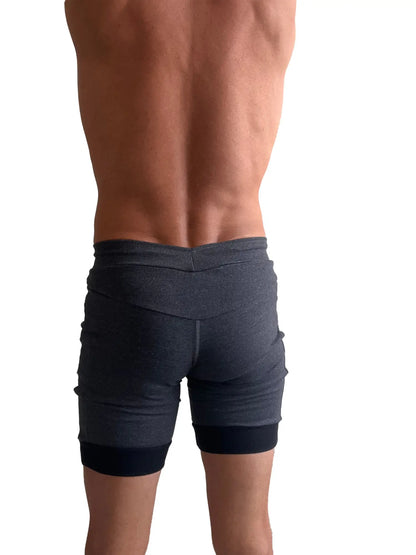 Dark gray ribbed cuffed yoga shorts with contrasting black waistband and hem in charcoal with black cuff