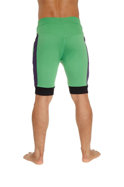 Green cuffed yoga shorts with purple side panels and black trim at waistband and cuffs for athletic wear