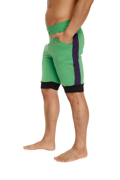 Green cuffed yoga shorts with purple side stripe and black trim at waistband and hem for athletic wear