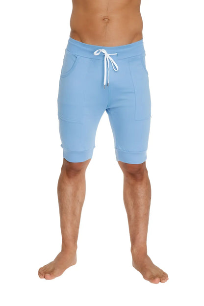 Light blue cuffed yoga shorts made of soft fabric with white drawstring and side pockets for comfortable wear