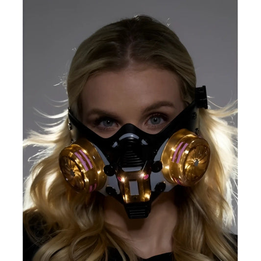 Cyberpunk light up mask black gas mask with gold filters and pink accents designed for futuristic style use