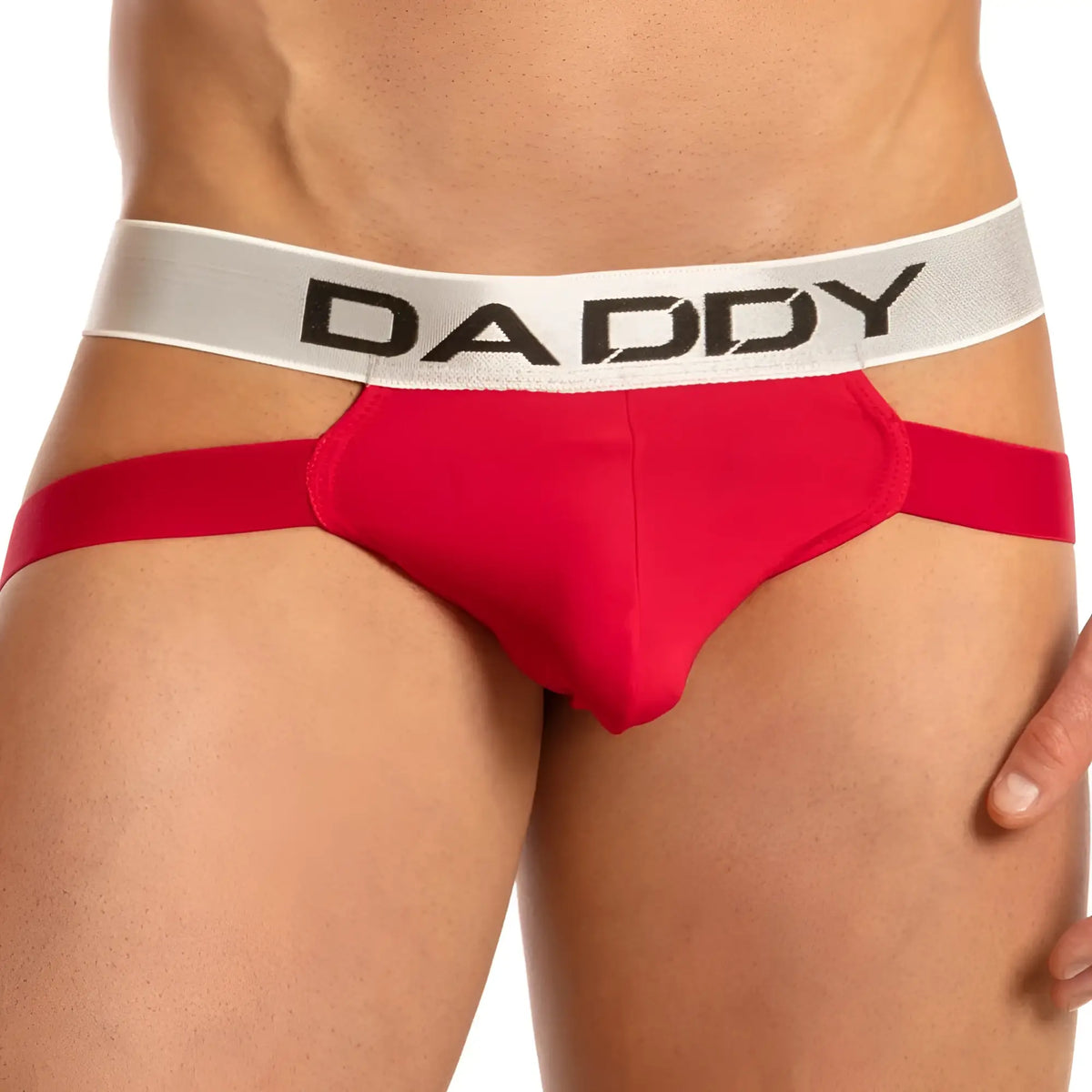 Red daddy brand briefs with a white waistband featuring black lettering in the daddy dde034 jockstrap style