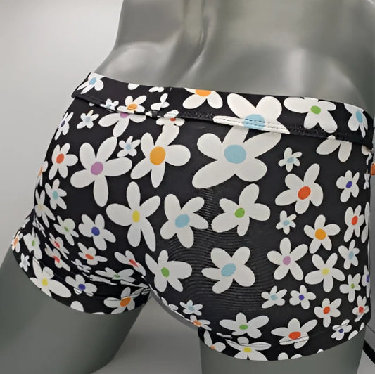 Black briefs daisy sq cut with a vibrant pattern of white daisies and colorful pink orange blue and green centers