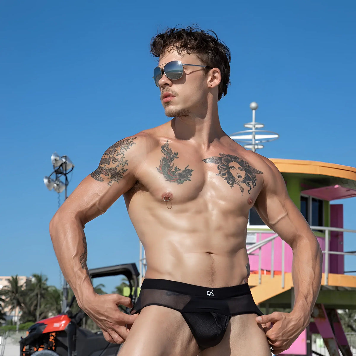 Black mesh briefs with a subtle logo on the waistband from daniel alexander dak062 thong collection