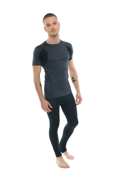 Dark gray and black designer raglan crew-neck tee with textured panels paired with form-fitting athletic leggings