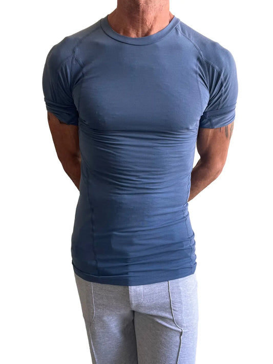 A fitted short-sleeved designer raglan crew-neck tee in solid navy blue with subtle seam detailing