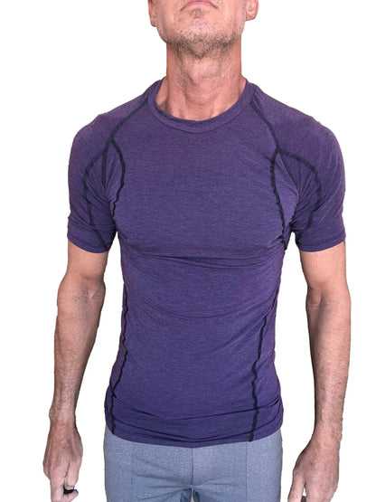 Designer raglan crew neck tee in eggplant purple with black seam detailing on a breathable compression fabric
