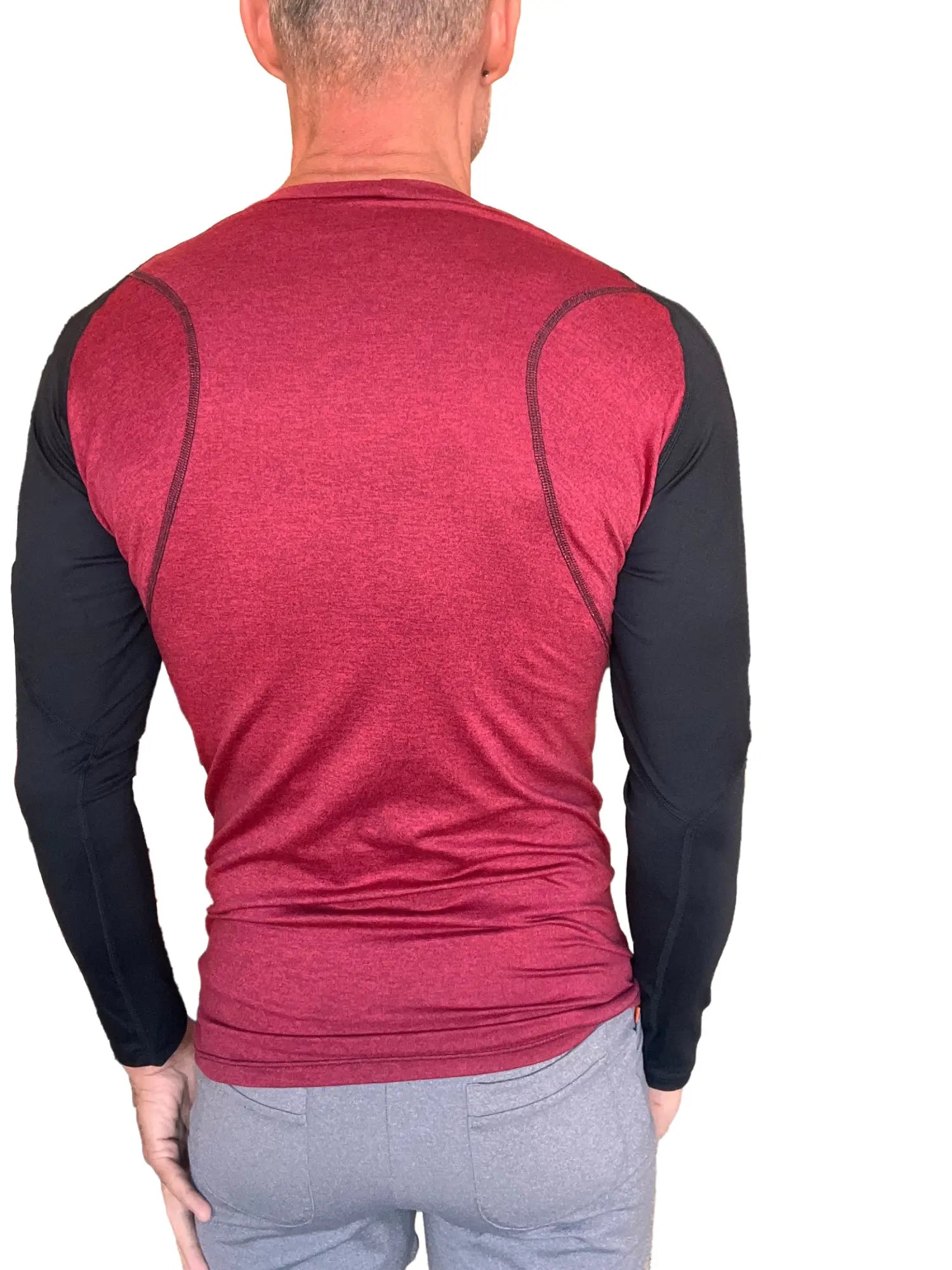 Men’s performance long-sleeve designer raglan crew-neck tee with heathered maroon torso and black sleeves with seam detail