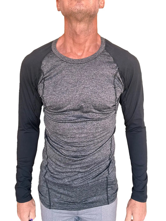 A men’s designer raglan crew-neck long sleeve tee with a heather gray torso and black sleeves in fitted athletic style