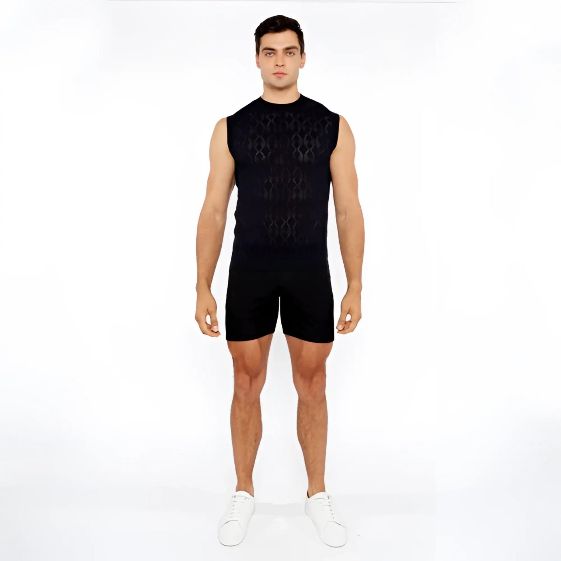 Black sleeveless diamond pointelle knit vest with intricate geometric pattern made of breathable knit fabric