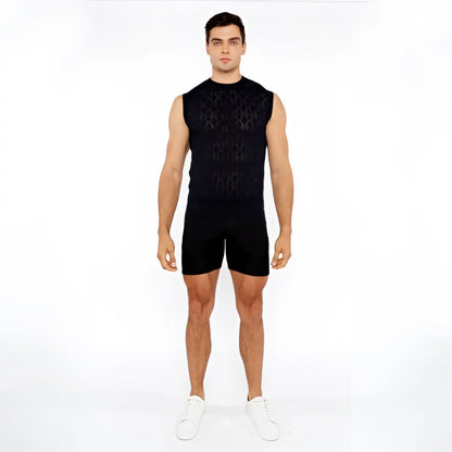 Black sleeveless diamond pointelle knit vest with intricate geometric pattern made of breathable knit fabric
