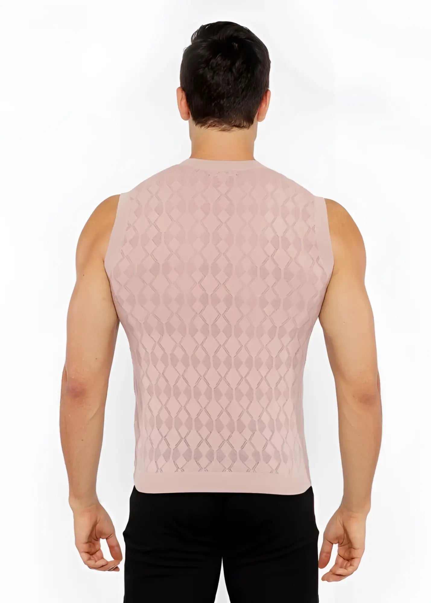 A pink knitted sleeveless vest with diamond-patterned texture made of pointelle knit fabric