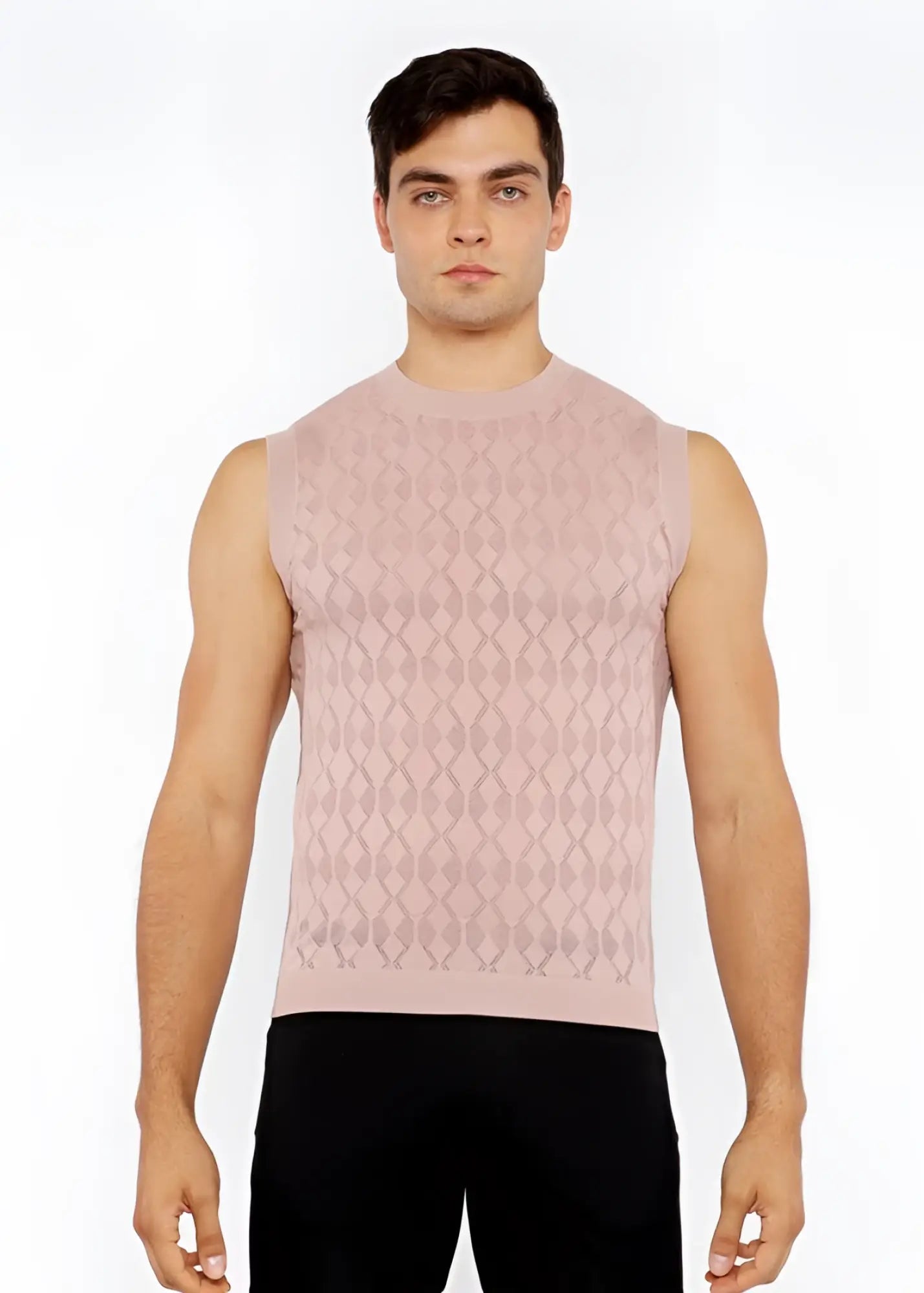 A soft pink sleeveless knit vest with subtle diamond pointelle texture perfect for layering and casual wear