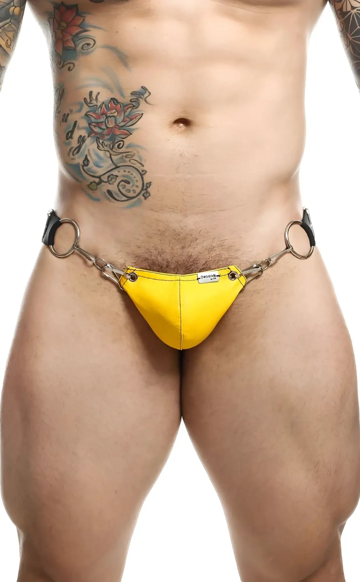 Bright yellow dngeon snap jockstrap thong with metallic chain and ring attachments high-cut design
