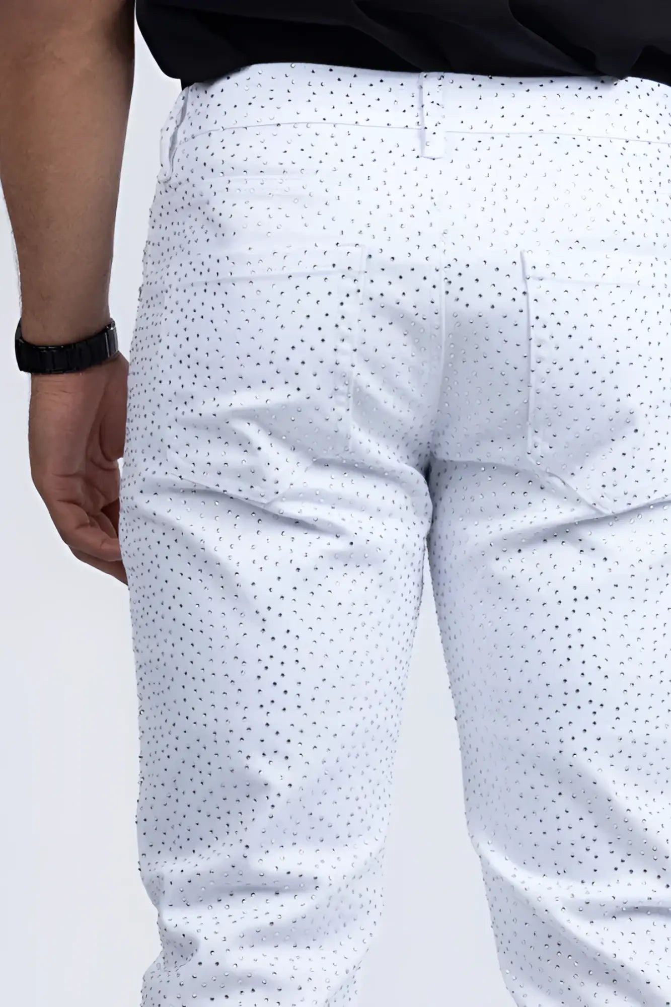 White dolorosa rhinestone jeans featuring subtle black dot pattern on lightweight denim fabric