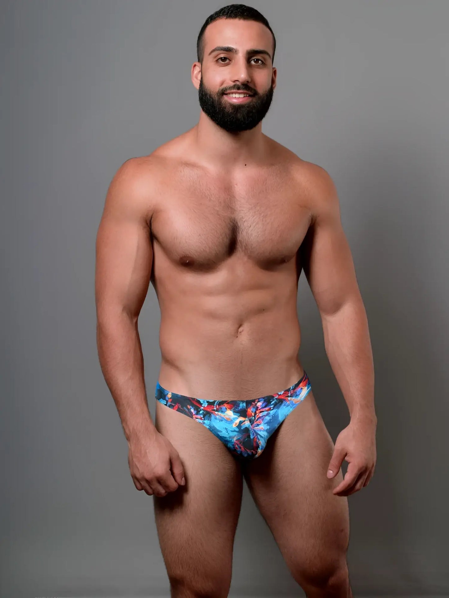 Doreanse 1341-PRN deep sea thong swim trunks with blue and red floral print for beachwear and swimming