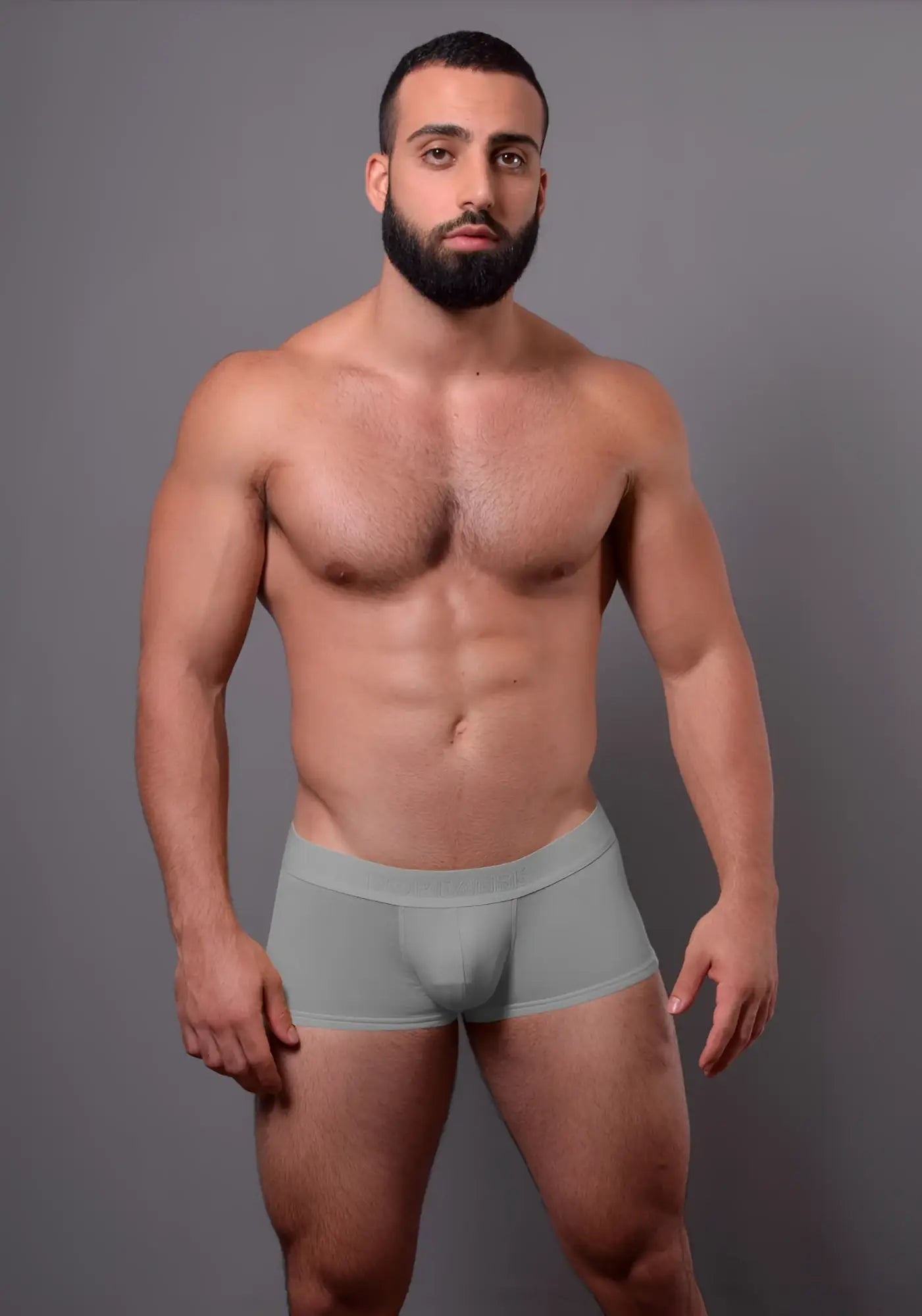 A pair of doreanse 1760-gry light gray seamless low-rise men’s briefs with a form-fitting design