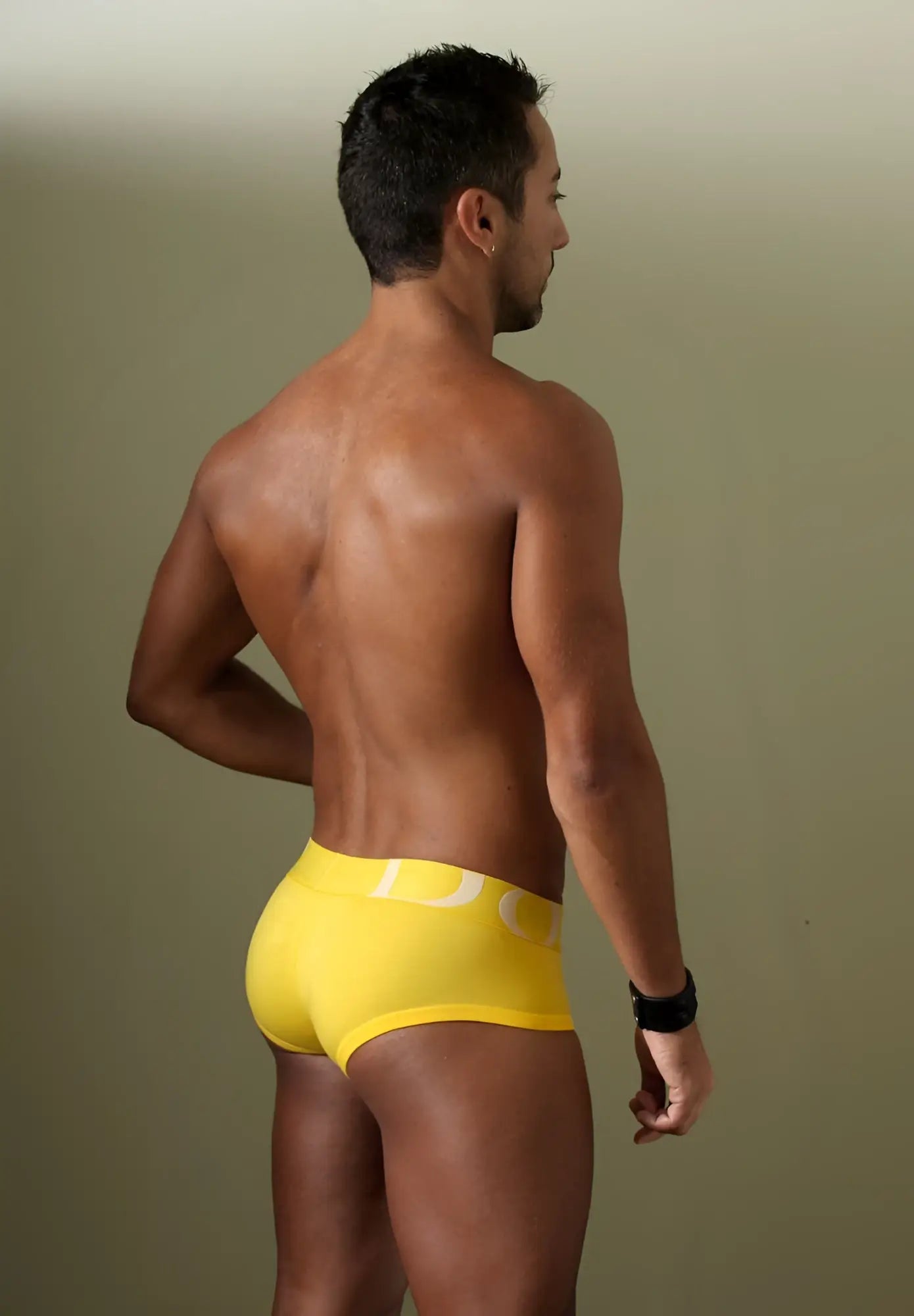 Bright yellow doreanse 1779-ylw pouch mini trunk briefs with white logo on the waistband for comfortable wear