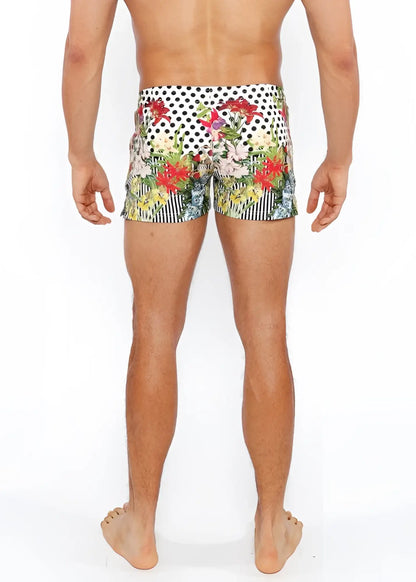 Dots abstract printed swim short featuring vibrant floral and polka-dot patterns with red pink green and yellow blossoms
