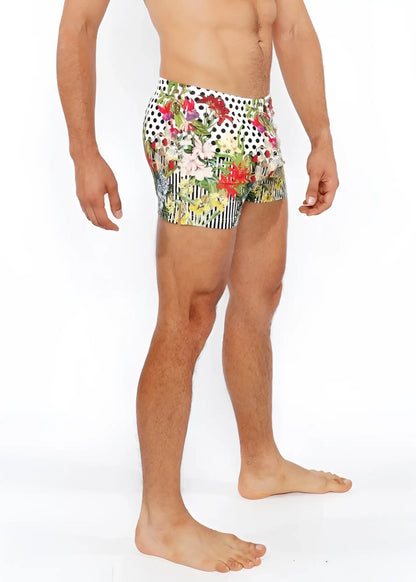 Dots abstract printed swim short featuring vibrant floral and polka dot patterns in bold colorful design