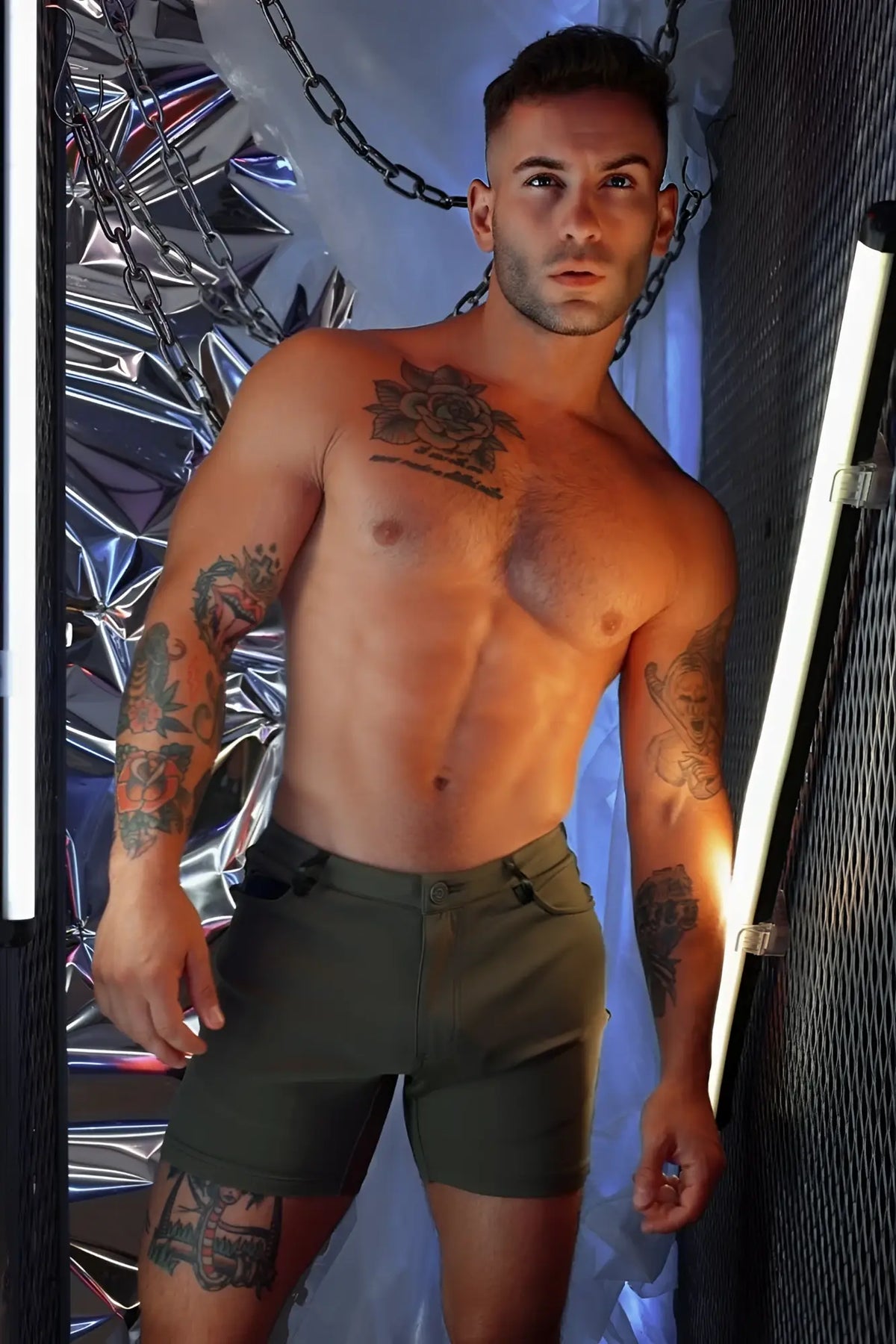 Olive green down low shorts with button closure and belt loops designed for casual summer wear