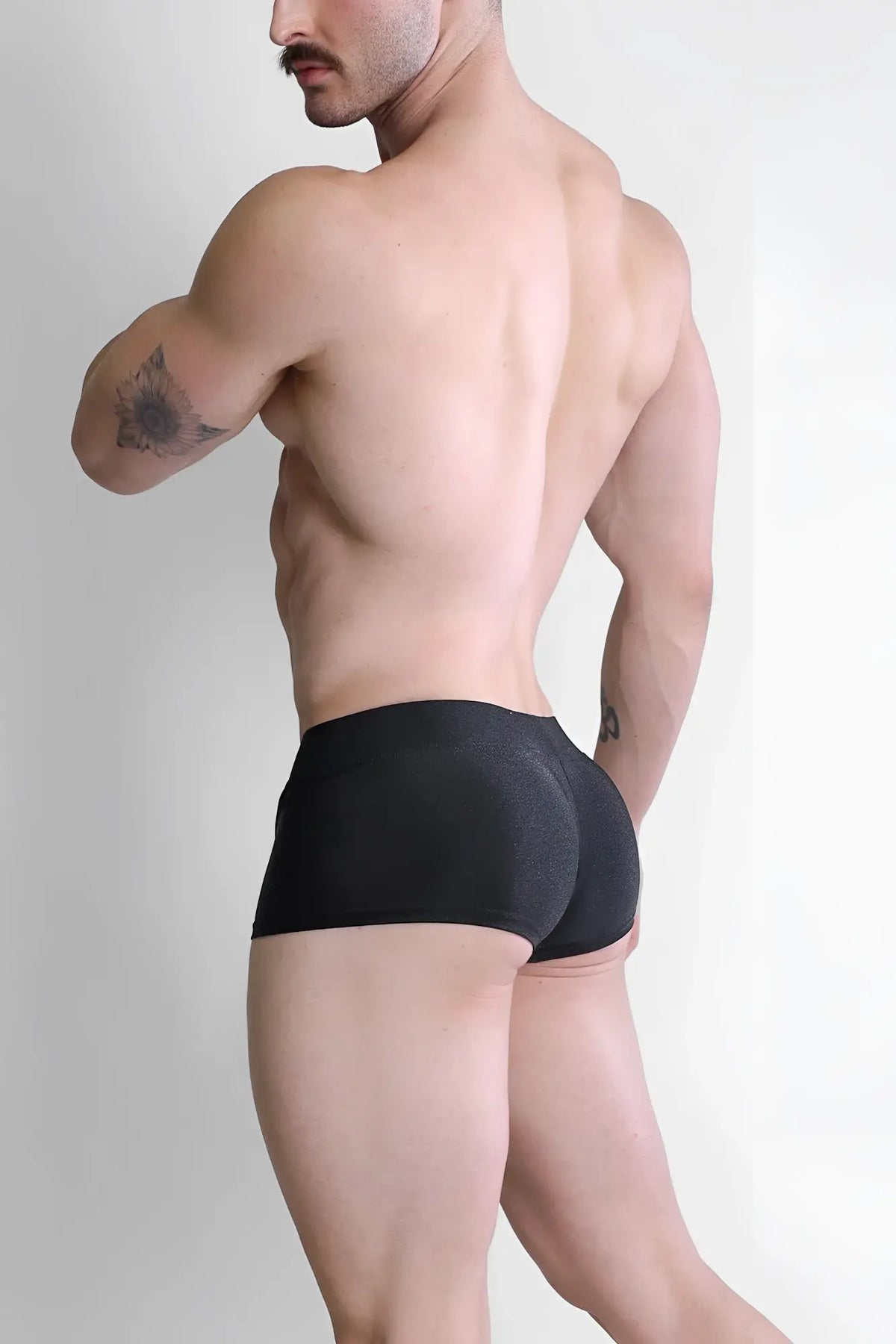 Black dynamic sheen boxer briefs with subtle textured pattern in form-fitting stretch fabric for everyday comfort
