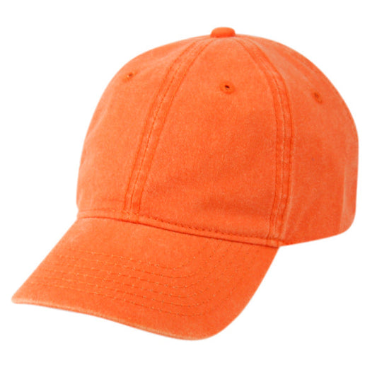 An orange, pigment-dyed baseball cap with a curved brim on a white background.
