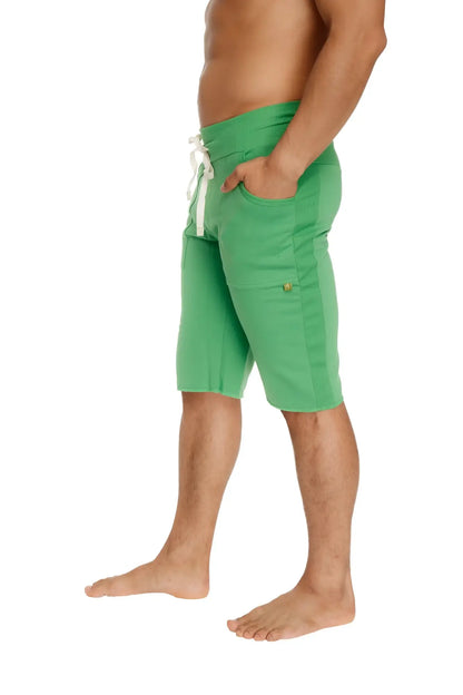 Eco-track short bamboo green athletic shorts with white drawstring and gold button on side pocket