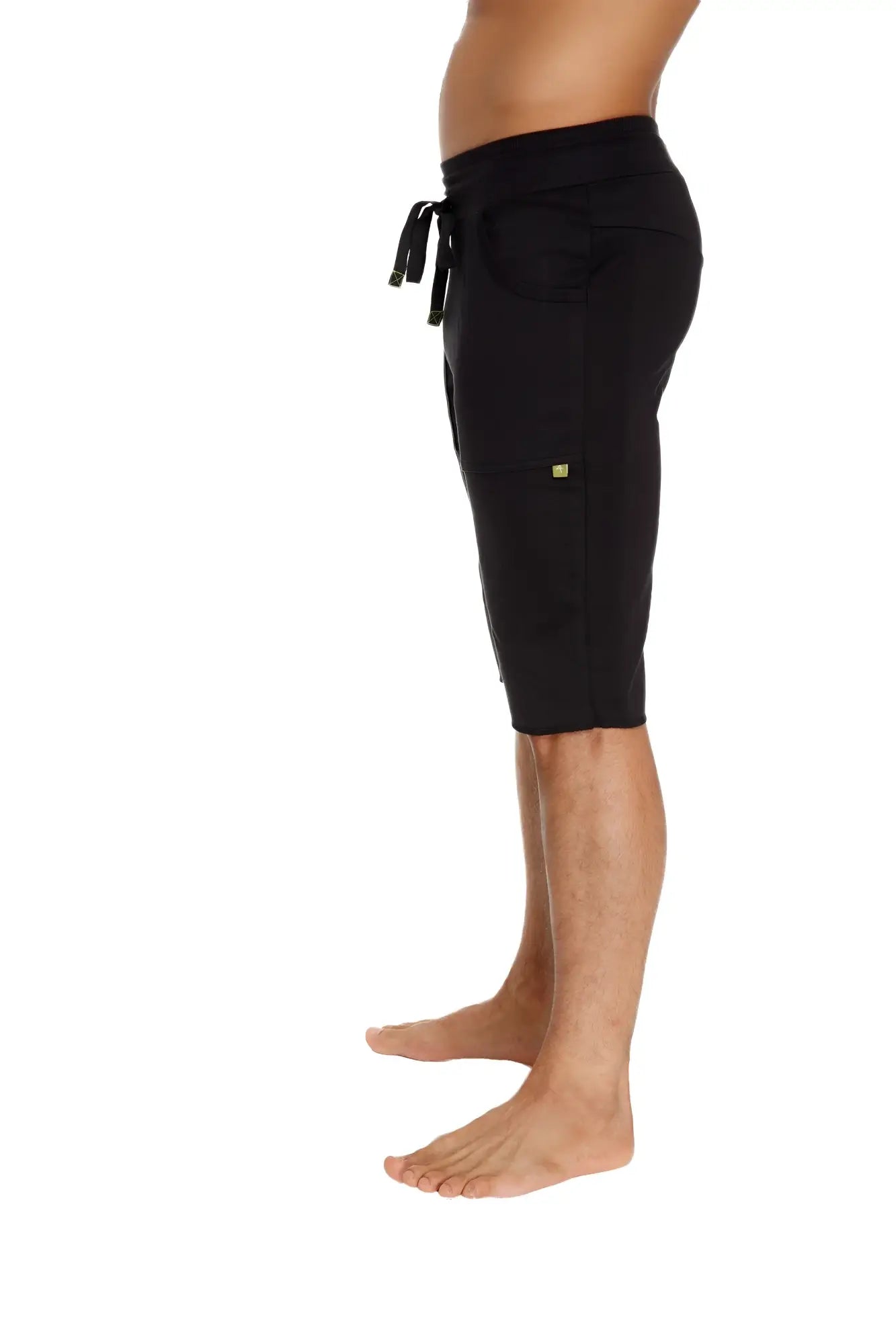 Black eco-track drawstring shorts with small gold logo on the side made from sustainable fabric for active wear