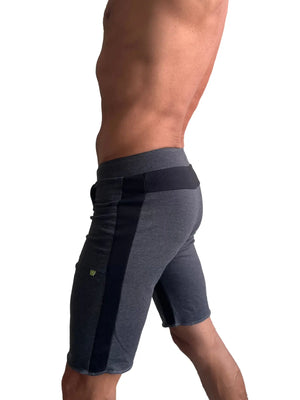 Dark gray eco-track short with black vertical stripe and elastic waistband designed for athletic use