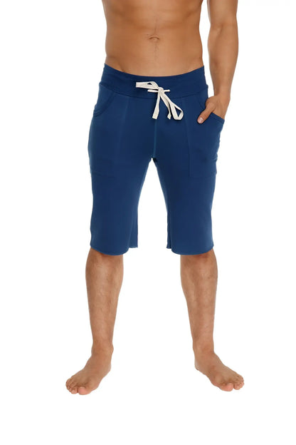 Navy blue cotton eco-track shorts with white drawstring waistband and side pockets for casual wear