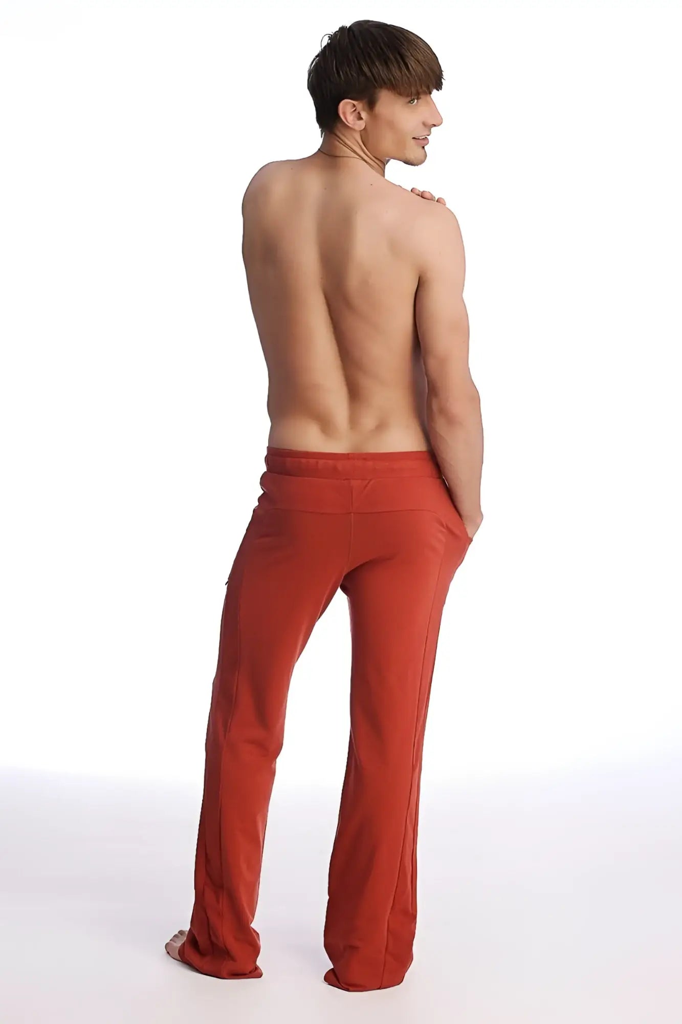 Eco-track and yoga sweat pant in cinnabar red with loose fit, straight leg, and elastic waistband for yoga and casual wear