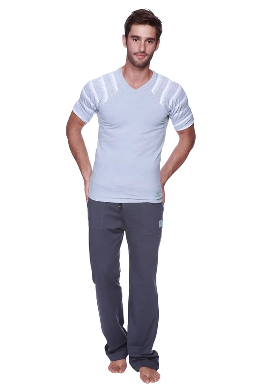A man wearing eco-track and yoga sweat pant solid charcoal dark gray relaxed fit with light gray v-neck t-shirt