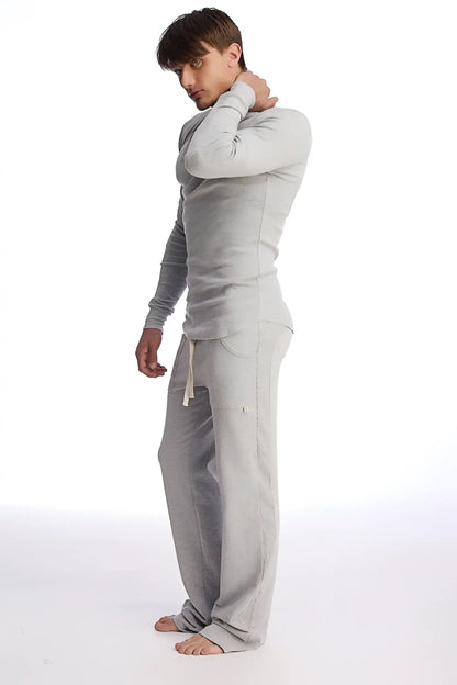 Gray eco track and yoga sweat pant and long sleeve top set made of soft fabric with relaxed fit in solid heather gray