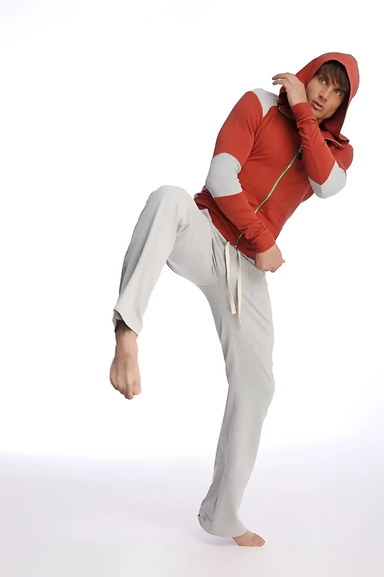 Red and gray zip-up hoodie with white sleeve panels paired with eco-track and yoga sweat pant in solid heather grey