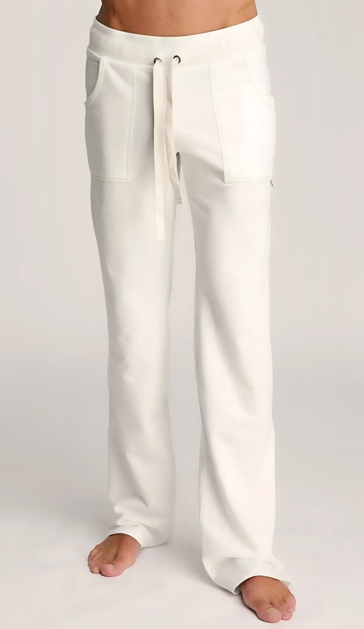 White eco-track and yoga sweat pant made of soft cotton with drawstring waist and side pockets for comfort