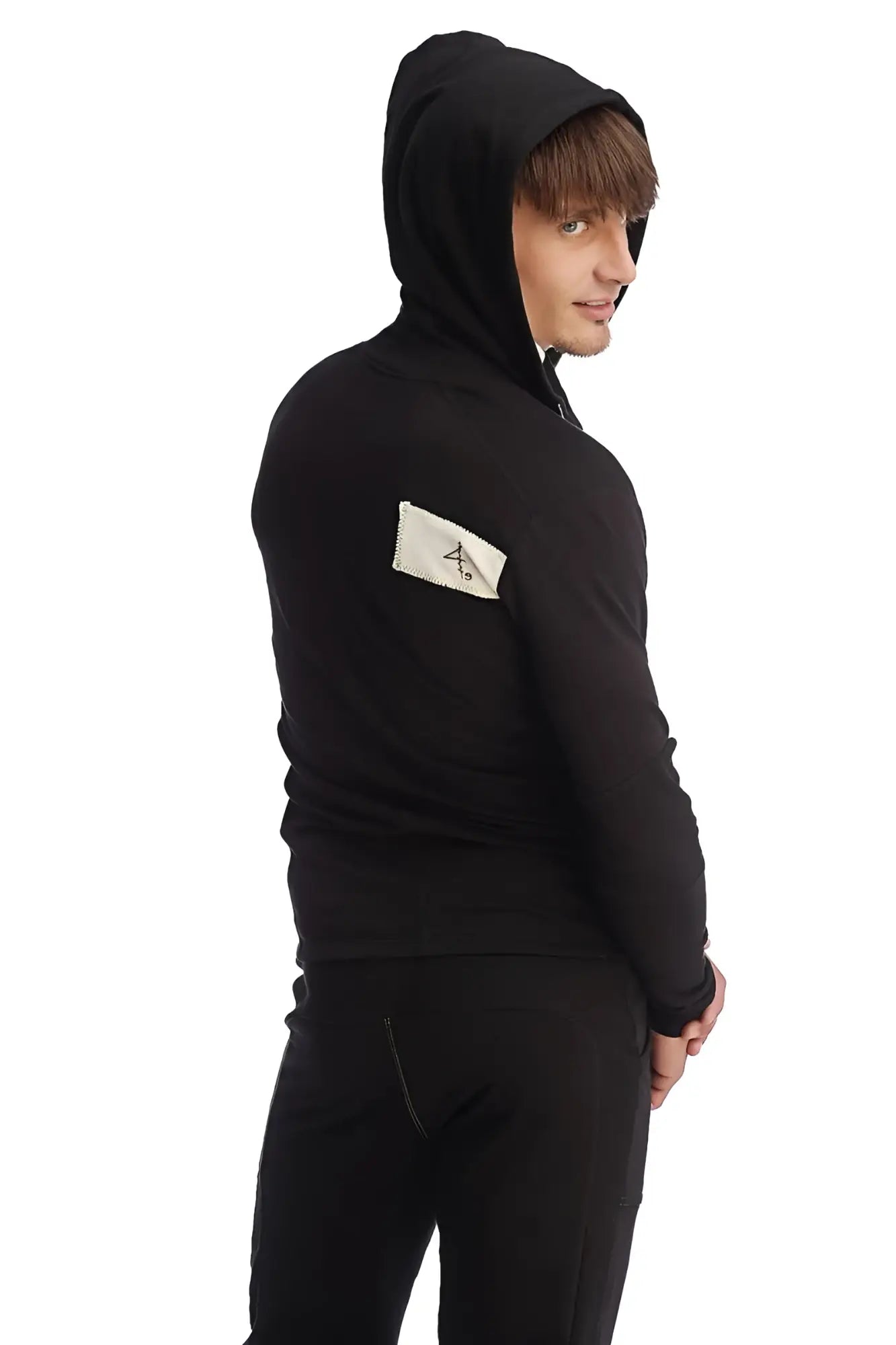 Black edge form-fit crossover yoga track performance hoodie with white logo patch on left sleeve in cotton blend material