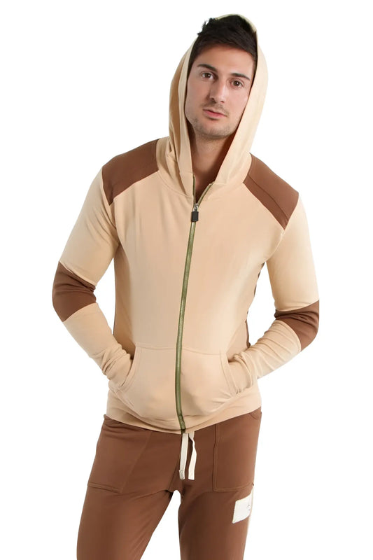 Edge form-fit crossover yoga track performance hoodie in sand and chocolate with contrasting green zipper