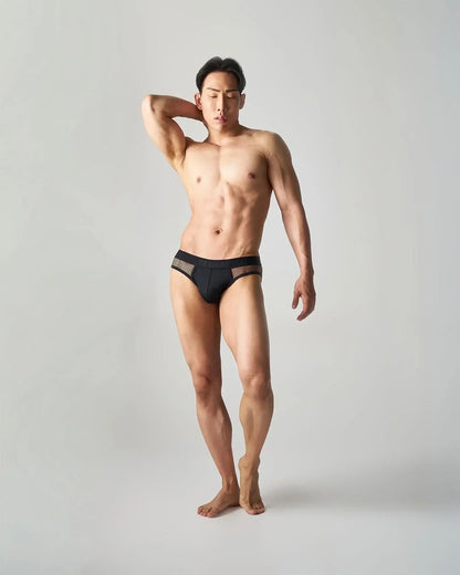 Black edge net brief with mesh panels on the sides for breathability and comfort