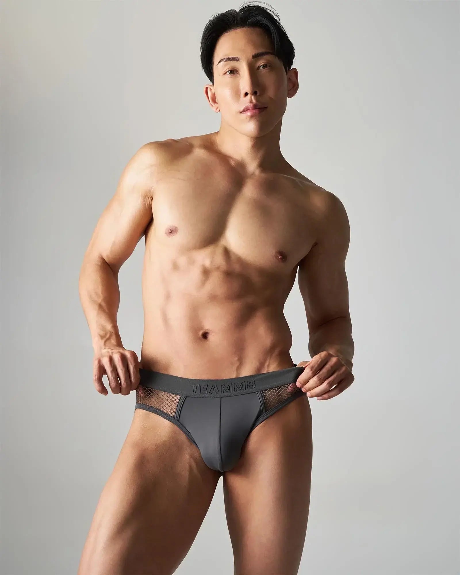 Dark gray calvin klein edge net briefs with mesh side panels for breathable comfort and style