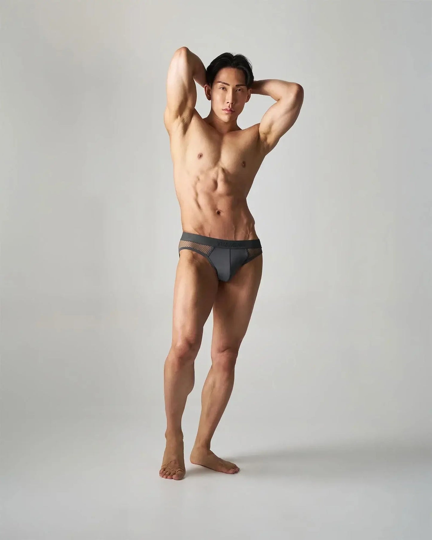 Dark gray edge net brief with breathable mesh trim featuring a comfortable low-rise design for everyday wear